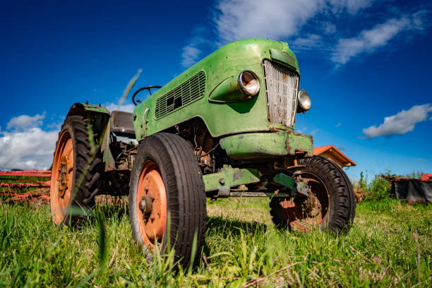 istock Old tractor in the Alpine meadows 2192263945