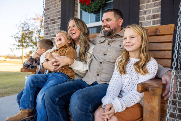 istock Riding on the porch swing at home 2192266216