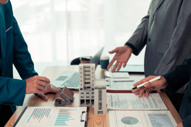 istock Real estate developers, architects and business teams working on a new business building project in a conference office highlight investment strategies and real estate decisions for future plans. 2192268256