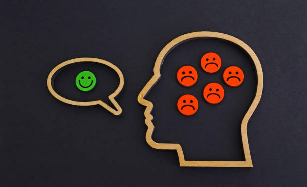 istock A head with negative emotions speaking positively. Inner conflict. 2192272271