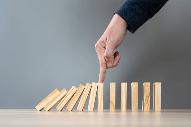 istock Concept of stopping domino effect 2192272834