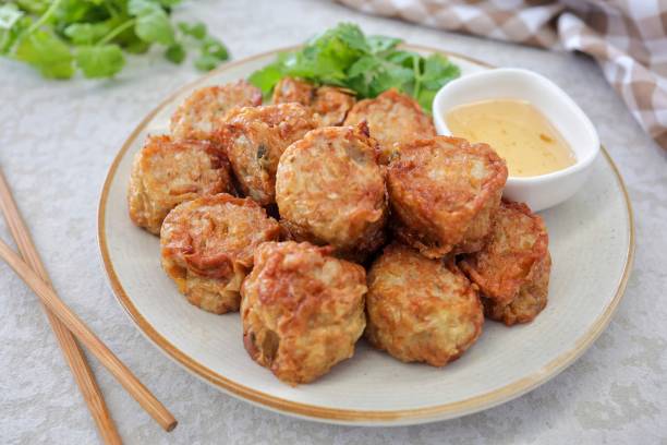 istock Deep Fried Crab Meat Rolls in ceramic plate , thai called Hoi Jo, 2192275063