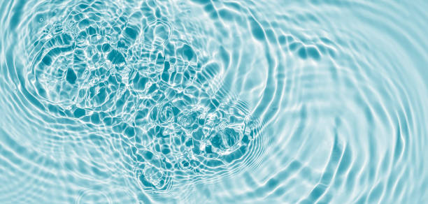 istock beuatiful rippled water surface with sunlight reflections from above, abstract fresh water texture background concept with copy space for travel, wellbeing or body and beauty care 2192275671