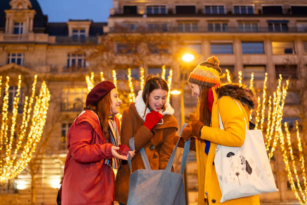 istock Happy friends shopping during winter holidays 2192277533