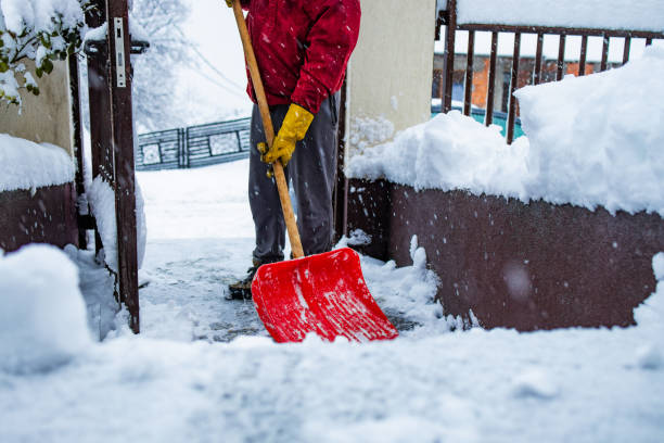 istock Man with snow shovel 2192279273