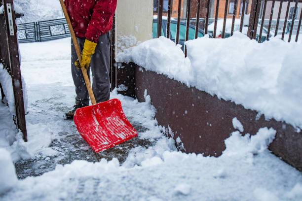 istock Man with snow shovel 2192279279