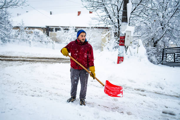 istock Man with snow shovel 2192279530