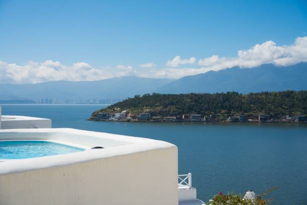 istock Luxurious terrace view with hot tub and mountains 2192279623