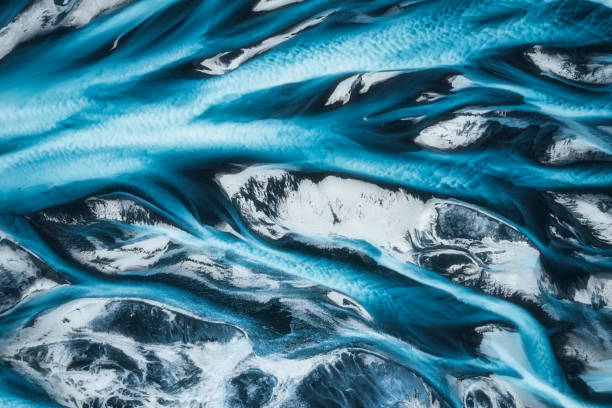 istock Abstract blue glacier river delta flowing through rugged landscape in Icelandic Highlands 2192281077
