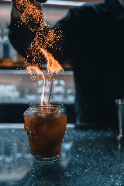 istock Bartender's fiery cocktail presentation 2192281435