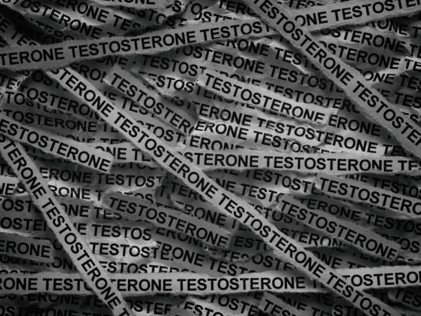 istock Strips of newspaper with the words Testosterone typed on them 2192283919