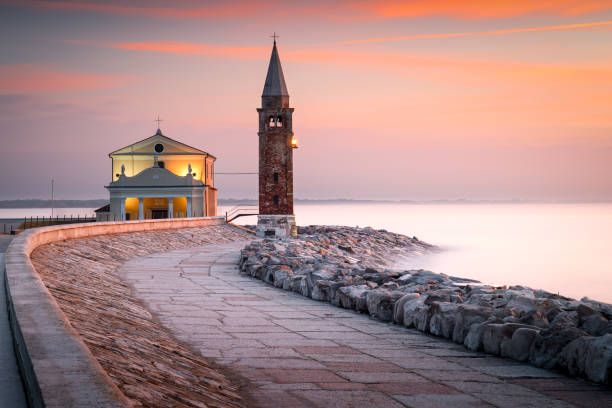 istock Promenade along waterfront, lighthouse. Caorle, Veneto, Italy. 2192284081