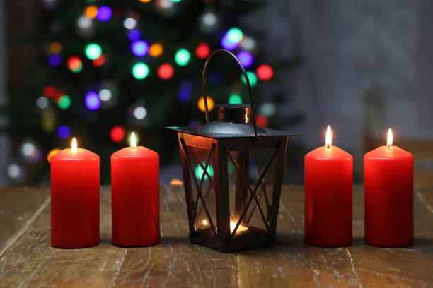 Advent Season, four candles burning. Advent background.