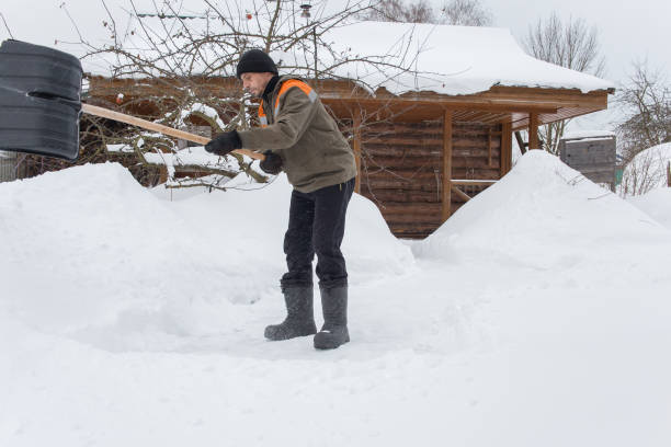 istock A European man removes snow 2192286014