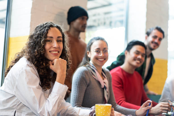 istock University students multiethnic team studying together  on a new project in creative coworking classroom - University concept - Bright filter with focus on first woman on left 2192287197
