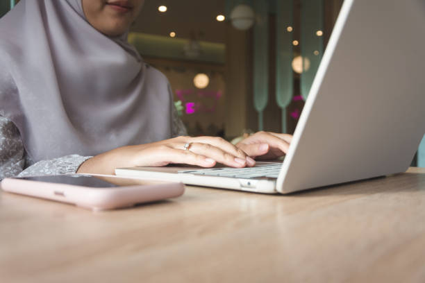 istock Closeup of woman hand's using laptop 2192287239