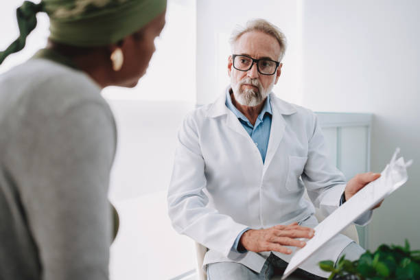 istock Oncologist talking to cancer patient 2192288905