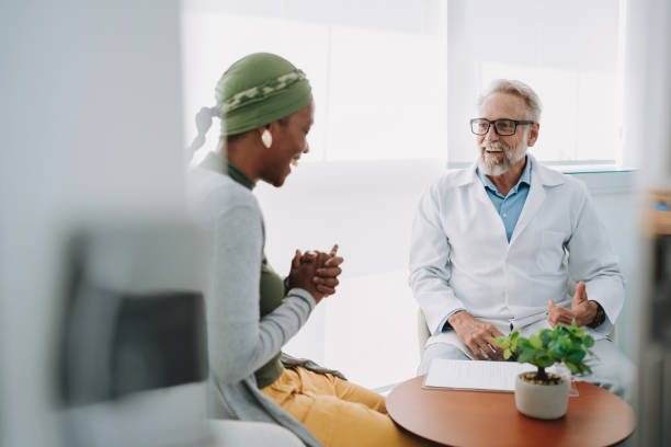 istock Oncologist talking to cancer patient 2192288929