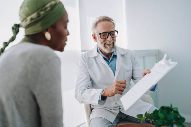 istock Oncologist talking to cancer patient 2192289029