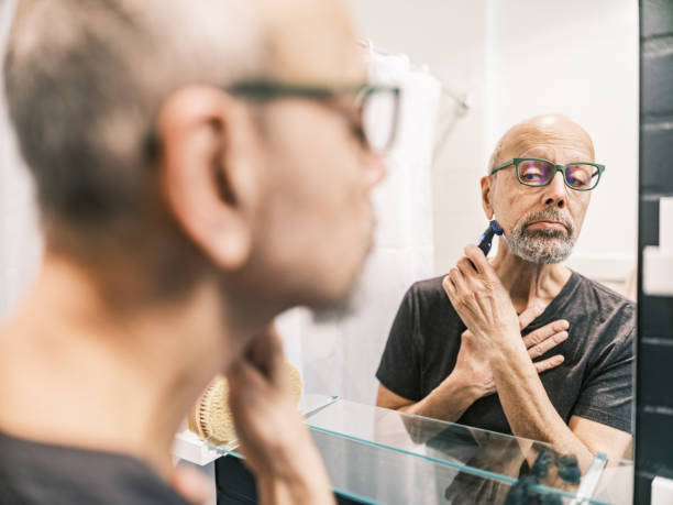 istock Senior man shaving the beard 2192292897