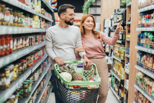 istock Couple shopping in supermarket. 2192299416