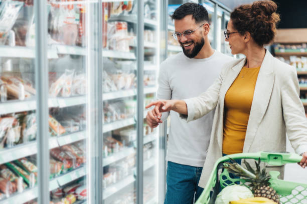 istock Couple shopping in supermarket. 2192299421