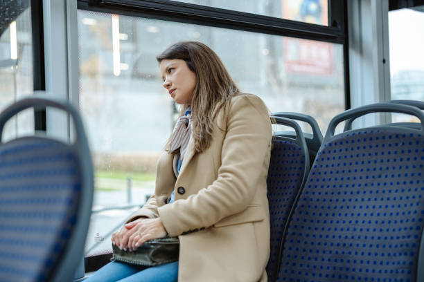 istock Exhausted woman commuting by the public transport 2192304765