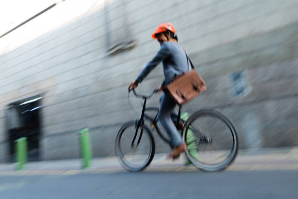 urban cyclist commuting to work in the city
