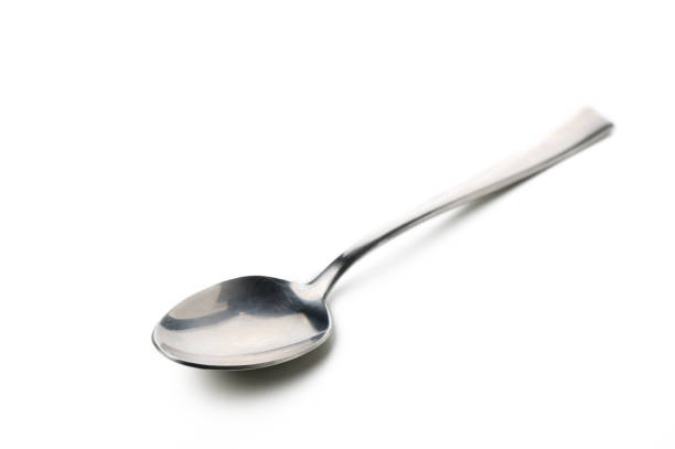 Silver shiny spoon isolated on white background. Stainless cutlery spoon. Ready to use for design image.