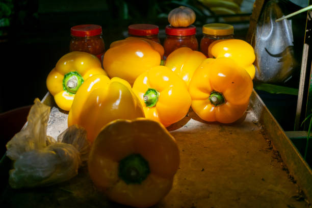 Fresh Yellow Bell Peppers and Garlic