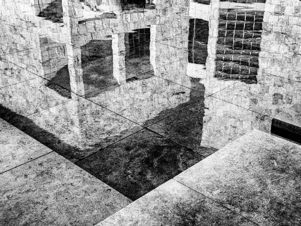 istock Abstract Building Reflection In A Pool In Black And White 2192315531