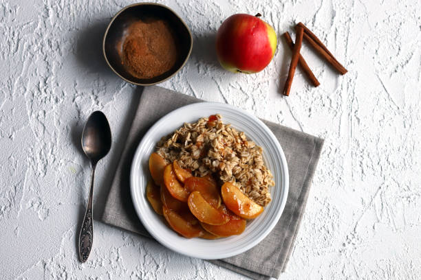 istock A bowl of oatmeal with caramelized apples and cinnamon. 2192323850