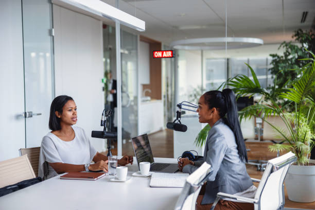 istock Engaged Mixed Race Female Professional on Podcast 2192324631