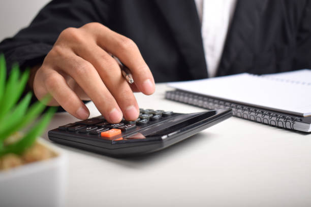 istock Accountant Businessman analyzes Invoice investment graph 2192325786
