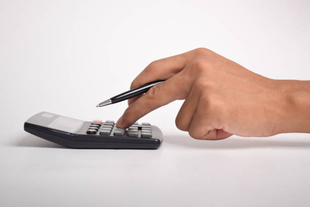 Businessman hand holding calculator isolated on a white background.