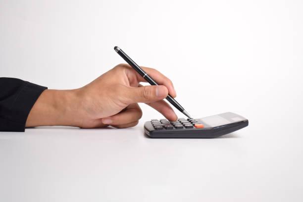 istock Businessman's hand holding a calculator 2192326779