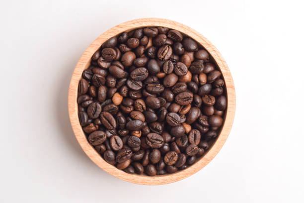 istock Coffee bean in wooden bowl 2192331569