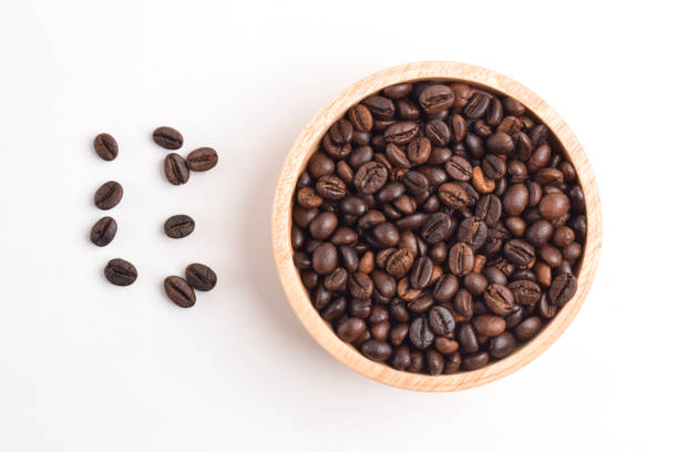 istock Coffee bean in wooden bowl 2192331581