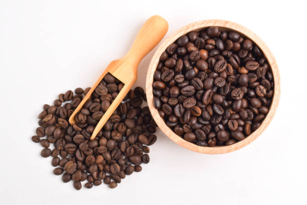 istock Coffee beans in wooden bowl 2192331611