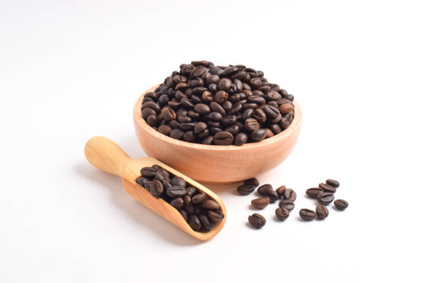 istock Coffee beans in wooden bowl 2192331613