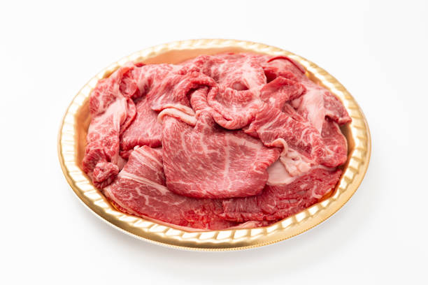Beef shoulder loin for sukiyaki on white background.