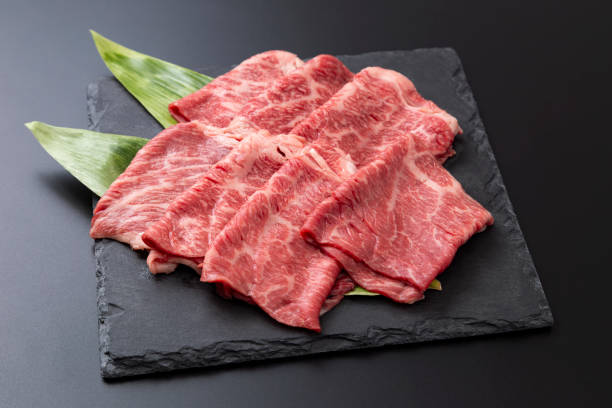 istock Beef shoulder loin for sukiyaki on a black background 2192332143