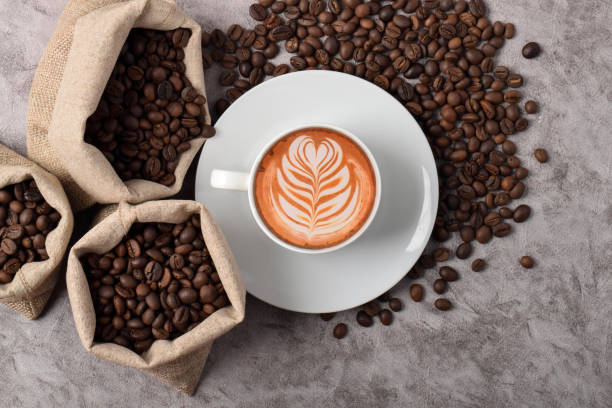 istock Cup of coffee and coffee beans 2192332710