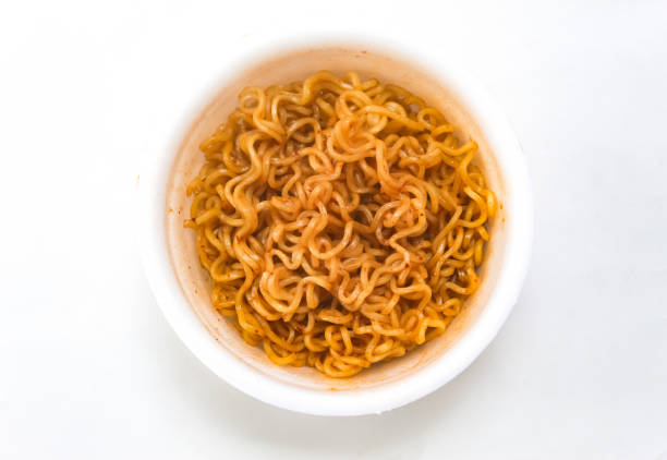 istock noodles in a bowl on a white background 2192340364