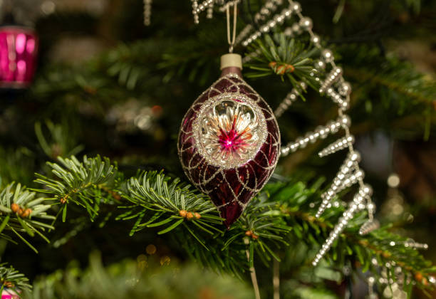 istock Christmas Bauble on Tree. Festive decorations on a Christmas tree. 2192340425