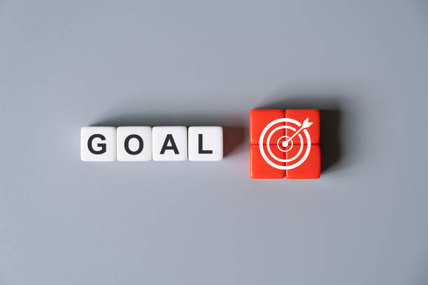 istock White cube shape with Goal and target icon with business or self improvement target and objective shot on grey background. Motivation and self discipline to achieve goal in life concept. 2192343974