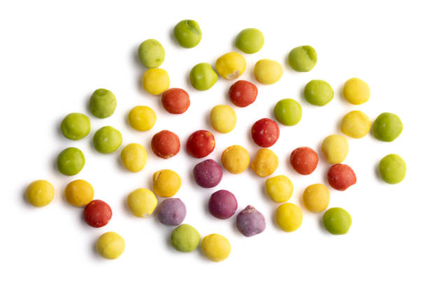 istock Dye-free natural candy with no artificial ingredients scattered on a white background in a rainbow shape, healthier alternative, good option for ADHD children 2192344262