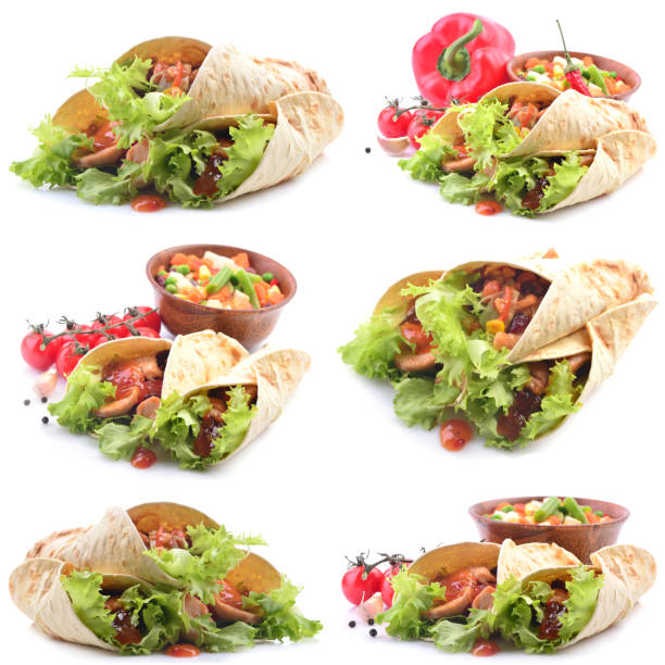 Mexican burrito with chicken and vegetables on a white background