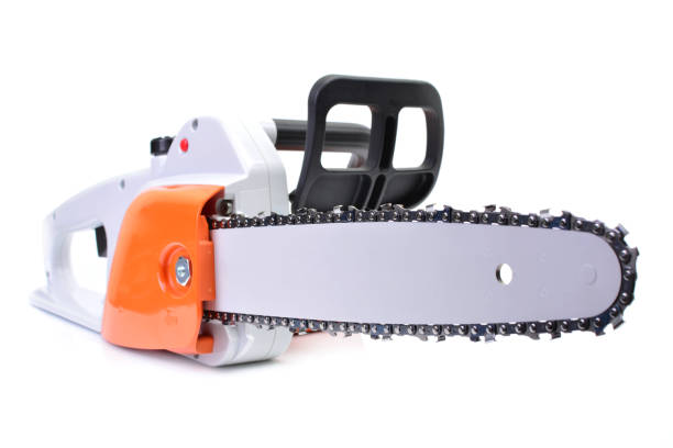 Man adding fuel from a plastic fuel can to his chain saw