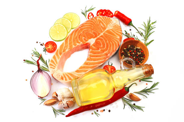 istock Salmon steak with spices and vegetables 2192351939